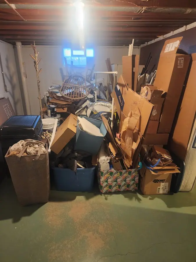 Roll-off dumpster container at job site for 4 Yard Dumpster Rental in Seward